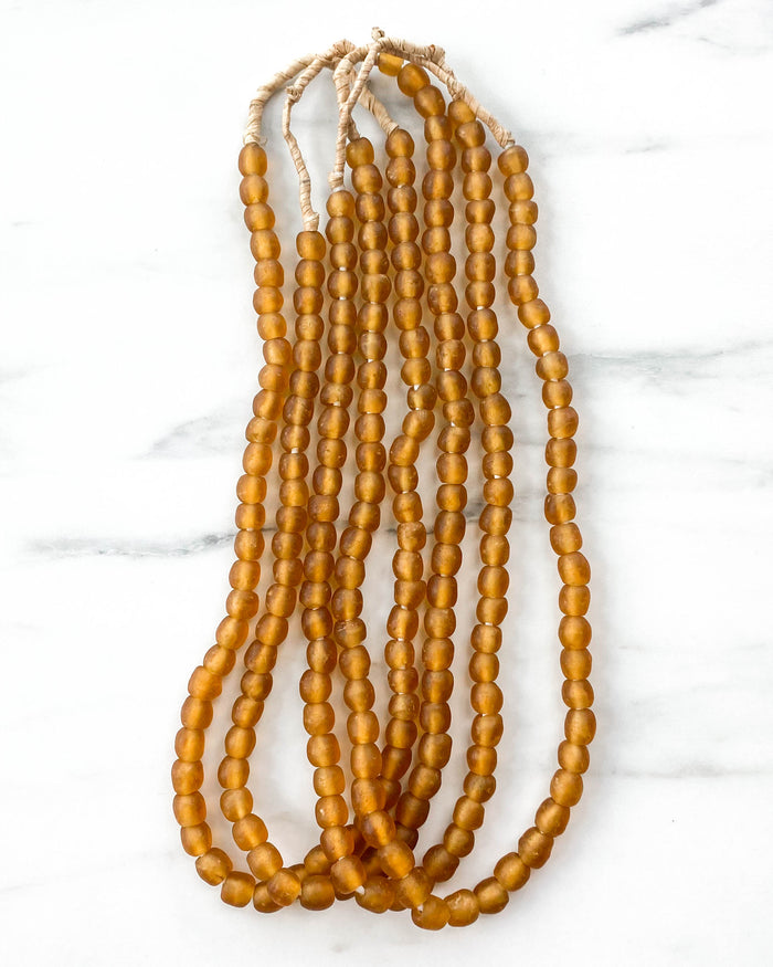 small handmade Ghanian amber glass beads