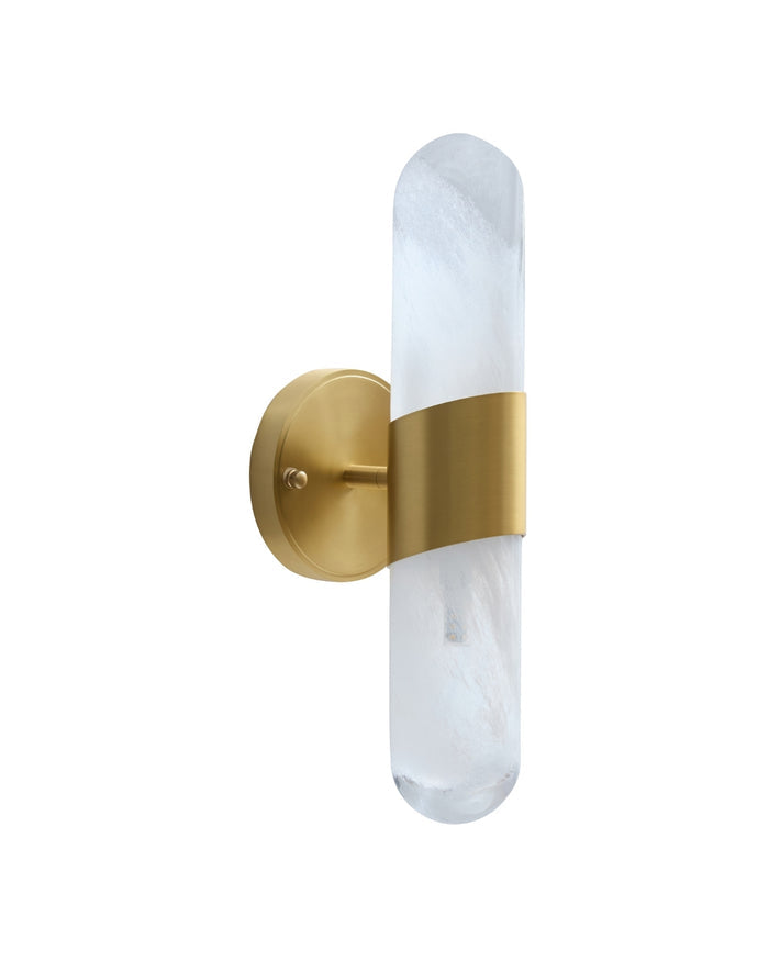 Wall-mounted light fixture with a vertical frosted glass cylinder attached to a round brass wall plate.