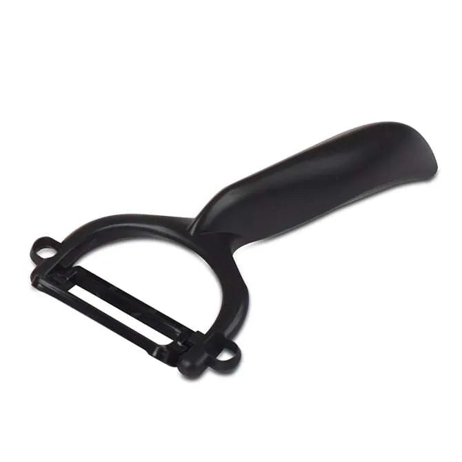 A black Kyocera ceramic peeler with a swivel ceramic blade and a plastic handle.