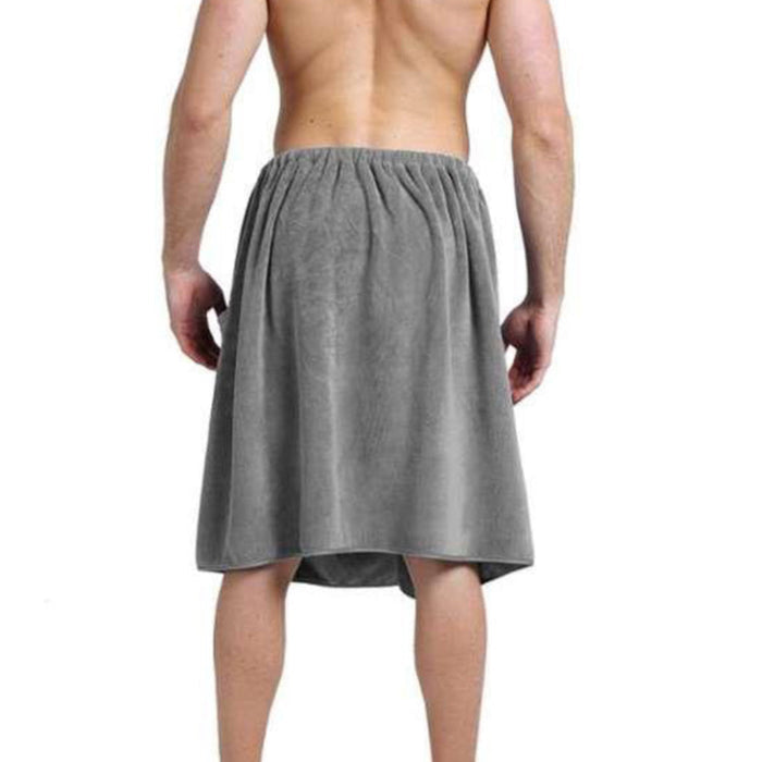 A man wearing a gray microfiber waist wrap with adjustable clips and a pocket.