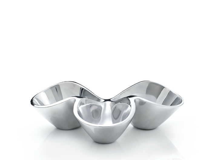 A silver triple condiment server with a smooth finish, designed with three separate compartments that areyling shaped to hold condiments.
