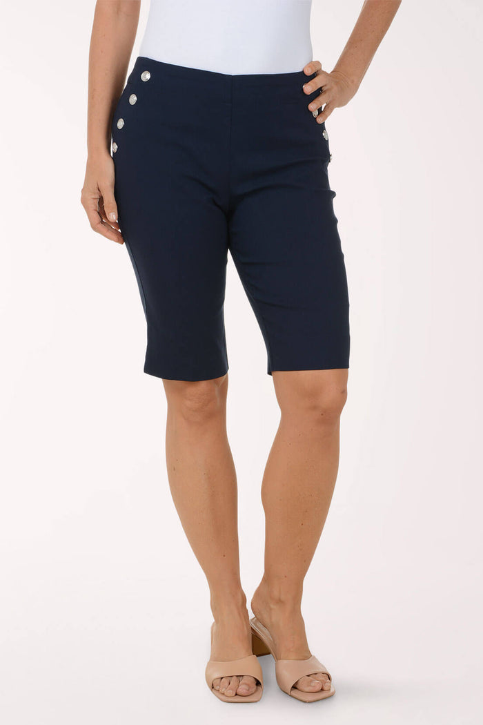 Navy blue shorts with decorative buttons on a white background