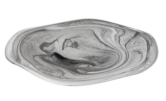 A clear glass charger plate with a gray swirl pattern.