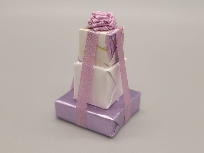 3 Tier Presents Wrapped in Purple and White Paper with Purple Bow – By Cheryl Warder