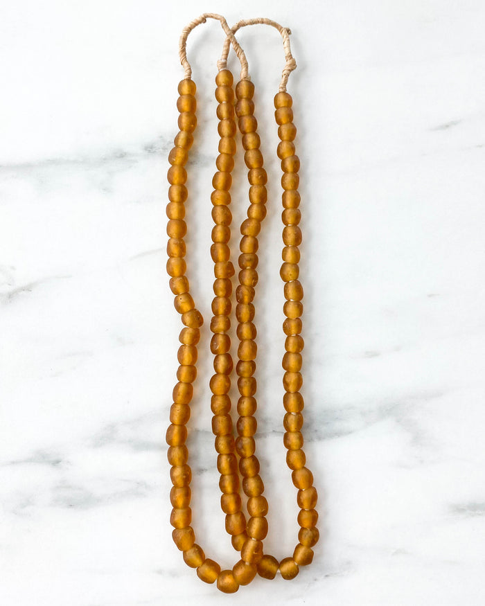 small handmade Ghanian amber glass beads