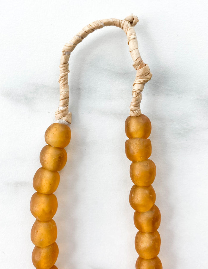 small handmade Ghanian amber glass beads