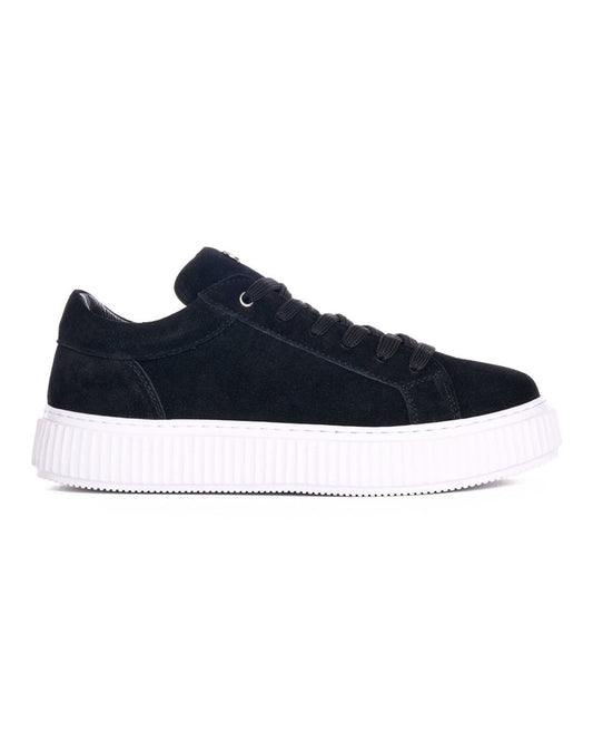 Martin Valen black genuine leather casual sneakers, side view showing textured white platform sole