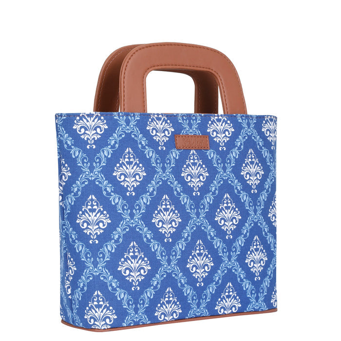 Women’s blue handcrafted printed canvas tote handbag with vegan leather handles for travel, work and everyday use-half side view