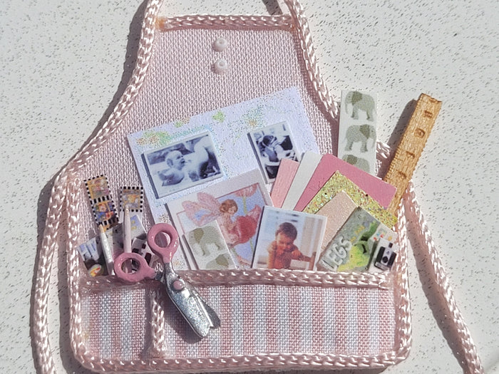 Cheryl Warder - Pink Child's Apron with Scrapbooking Supplies