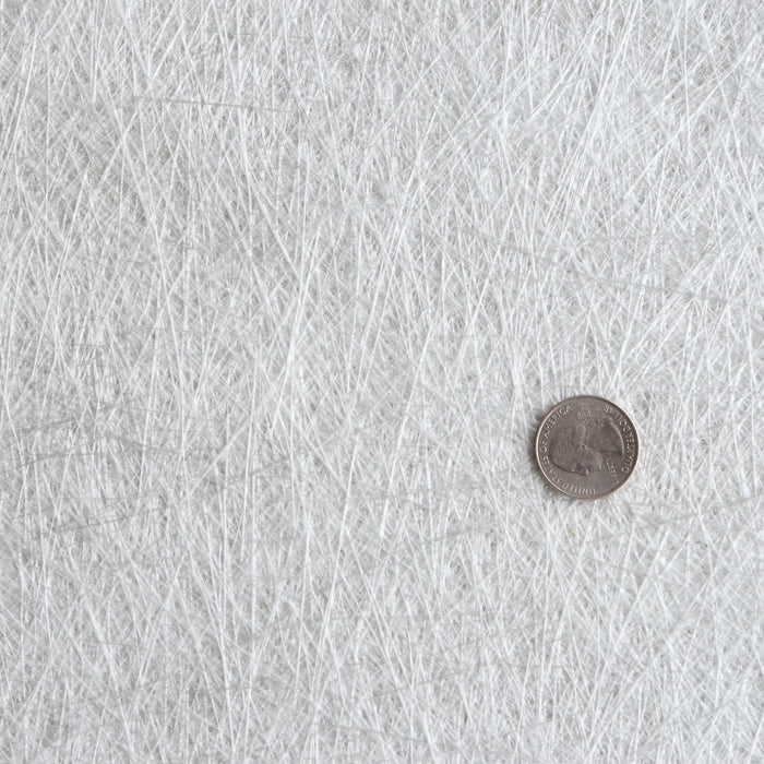 Fiberglass mat made up of short strands of fiberglass.