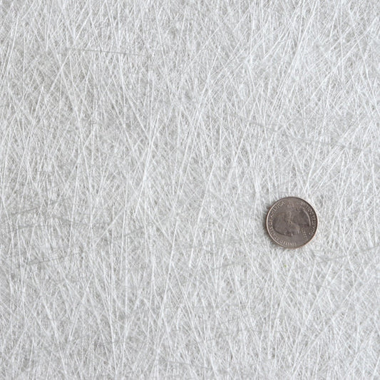 Fiberglass mat made up of short strands of fiberglass.
