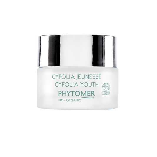 Jar of Cyfolia Youth Glow Renewing Wrinkle Cream | Phytomer in frosted glass with silver lid, featuring organic skincare designed for youthful skin glow.