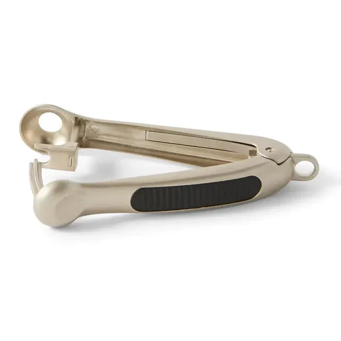 A cherry pitter on white background.