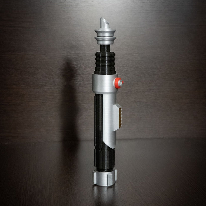 Ezra Bridger second lightsaber hilt cosplay prop in black and silver plastic with red button detail for Star Wars fans and collectors