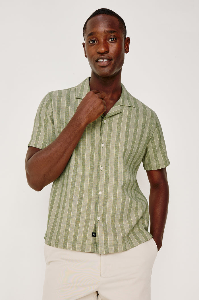 Fielder Button Front Shirt With Short Sleeves and Relaxed Boxy Fit in Sage Brush Stripe Colorway - Upper Body Front View Featured on Model