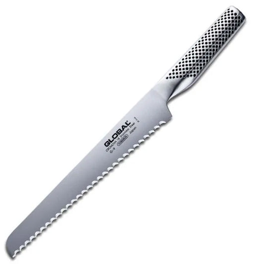 A large serrated stainless steel bread knife with a 8.5 inch blade and a dimpled handle.