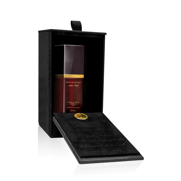 Jamr Al Oud Jamr Midnight perfume bottle in a luxurious black gift box