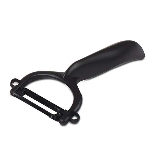 A black Kyocera ceramic peeler with a swivel ceramic blade and a plastic handle.