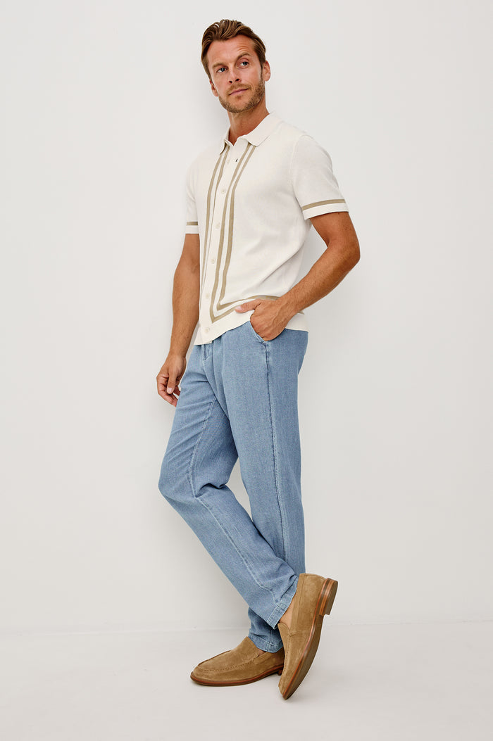 Leo Knit Sweater Polo in Yarn-Dyed Cotton Blend With Collar, Front Buttons, and Short Sleeves in White Cashew Colorway - Full Body Front View Featured on Model