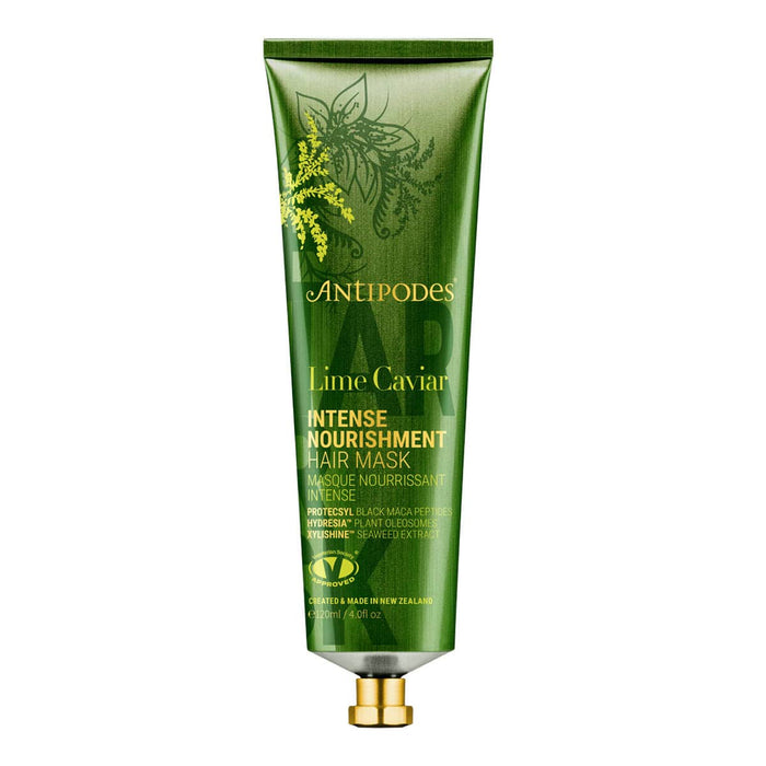 Green hair mask tube with Antipodes branding on a white background.