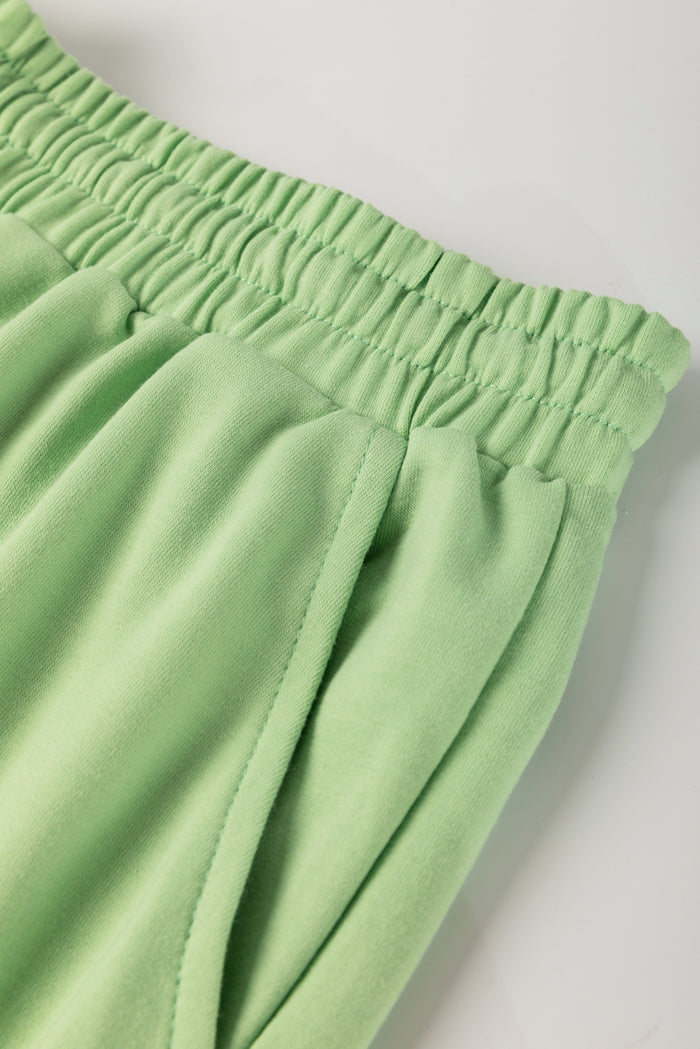 Meadow Mist Green Plus Size V Neck Drop Shoulder Tee Loose Shorts 2pcs Outfit