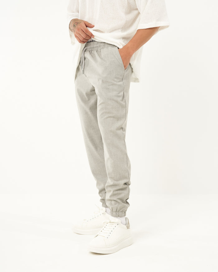 Martin Valen men's loose-fit gray jogger with elastic cuffs, full standing view