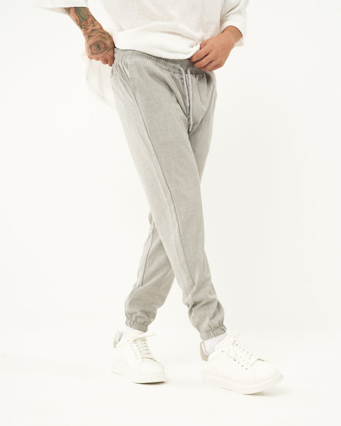 Martin Valen men's gray jogger, close side shot focusing on elastic waistband and drawstring