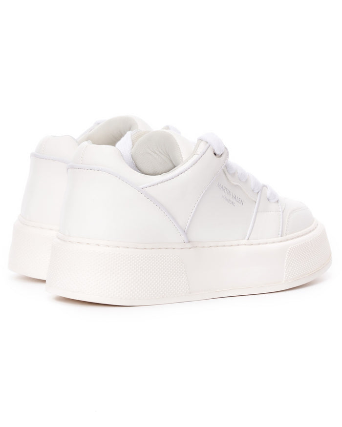 Martin Valen men's white high sneakers, rear three-quarter studio view highlighting padded heel collars and textured platform sole