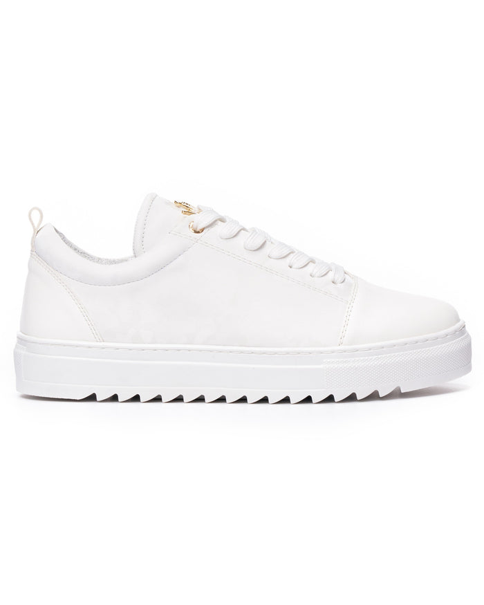 Martin Valen men's low-top white sneaker, side view showing chunky serrated platform sole and subtle camo pattern