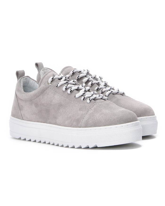 Martin Valen pair of grey low-top sneakers three-quarter front view, white laces with black pattern visible
