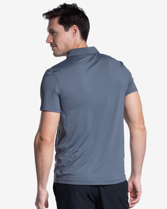 Man wearing short sleeve polo shirt in smoke - back shown.  (Style 11004) - BloqUV