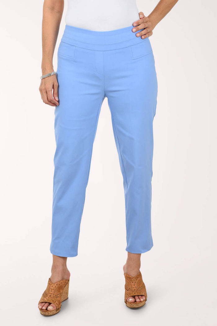 Light blue pants worn by a person on a white background