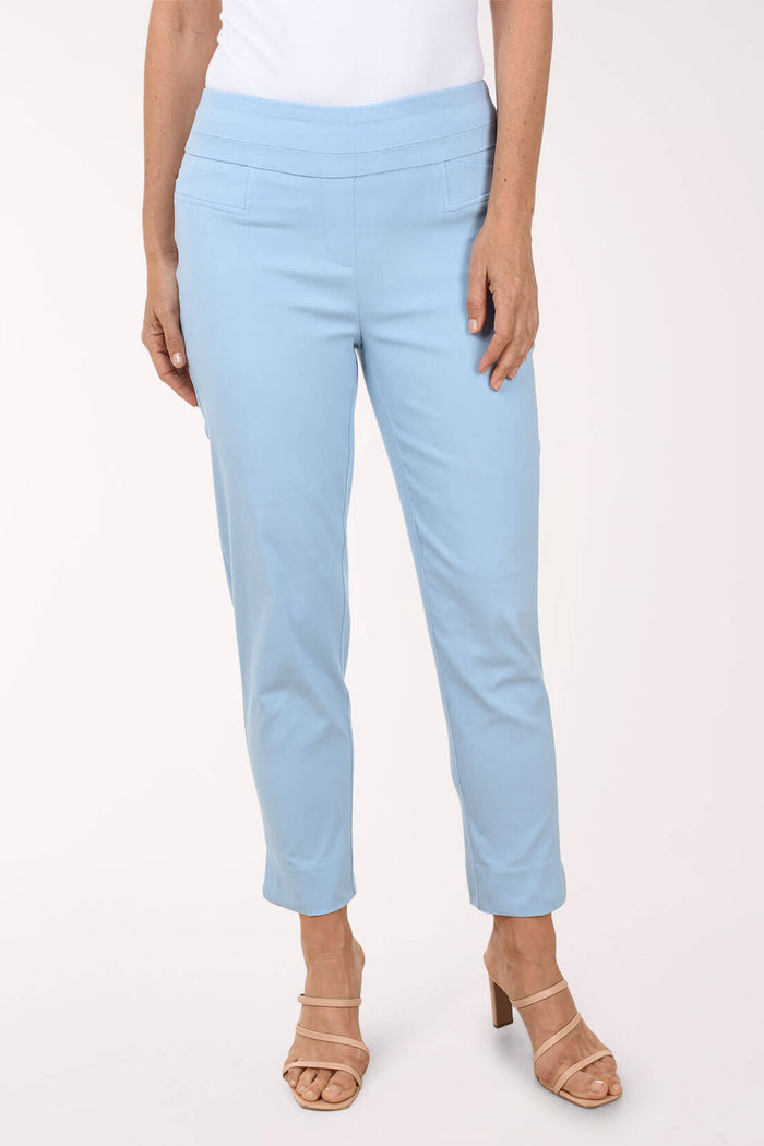 Powder blue pants worn by a person on a white background