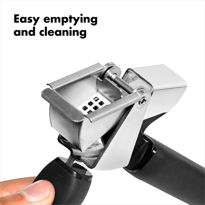 Can opener with text 'Easy emptying and cleaning' on a white background