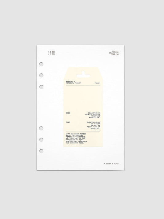 Personal Toolkit Planner Dashboard in A5 6-Ring Punch, a cardstock dashboard with an affixed warm gray printed tag in black type on a light gray background
