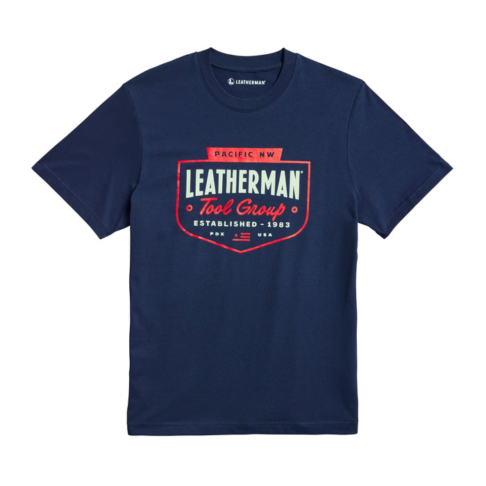 Navy Leatherman Pacific Northwest tee with a red emblem logo. Established 1983.