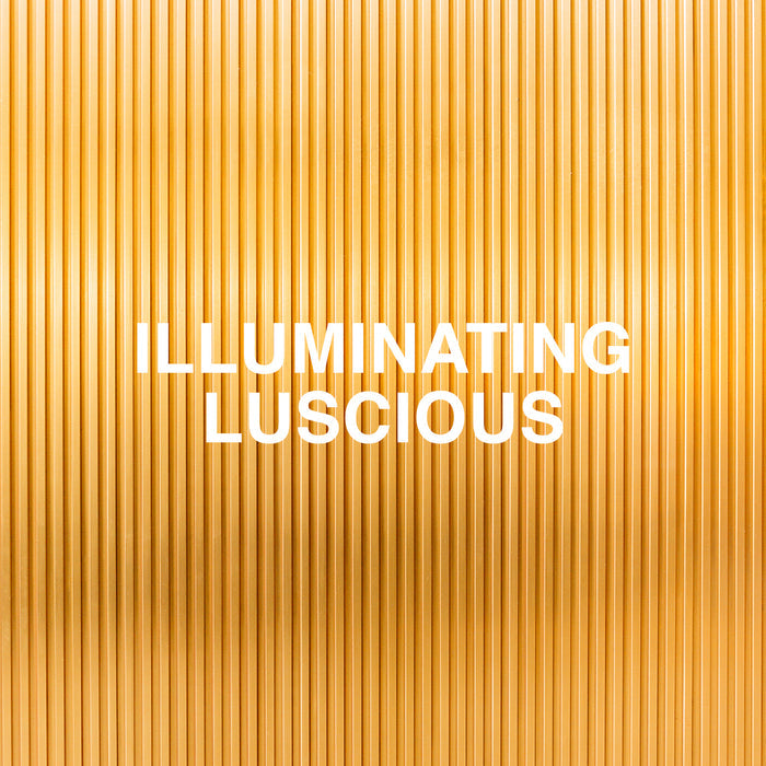 A textured golden background with the words "Illuminating Luscious" in bold white font.