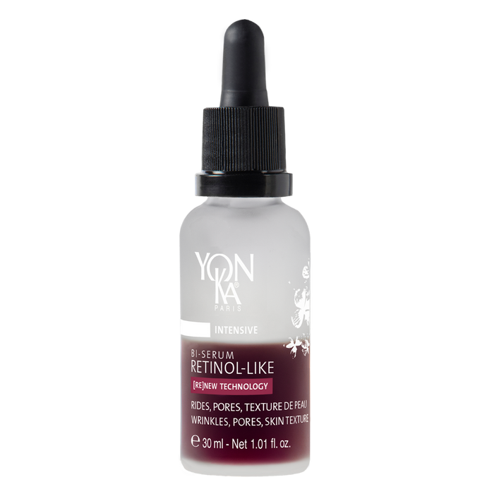 Bottle of Retinol-Like Bi-Serum | Yon-Ka Paris with dropper cap, featuring clear frosted glass and label highlighting skincare benefits for wrinkles, pores, and skin texture.