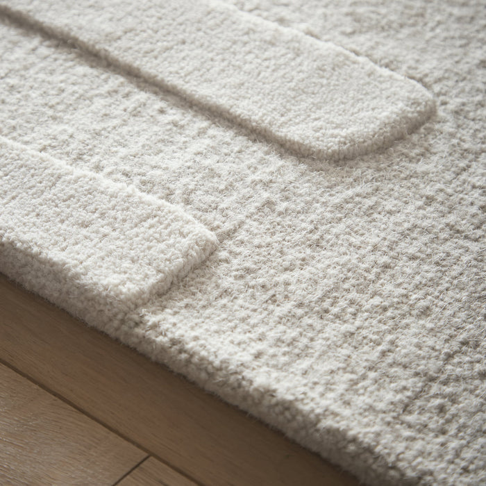 Sculptured Wool Stone Rug in Cream. 100% wool cut & loop pile rug in Cream with a patterned design.