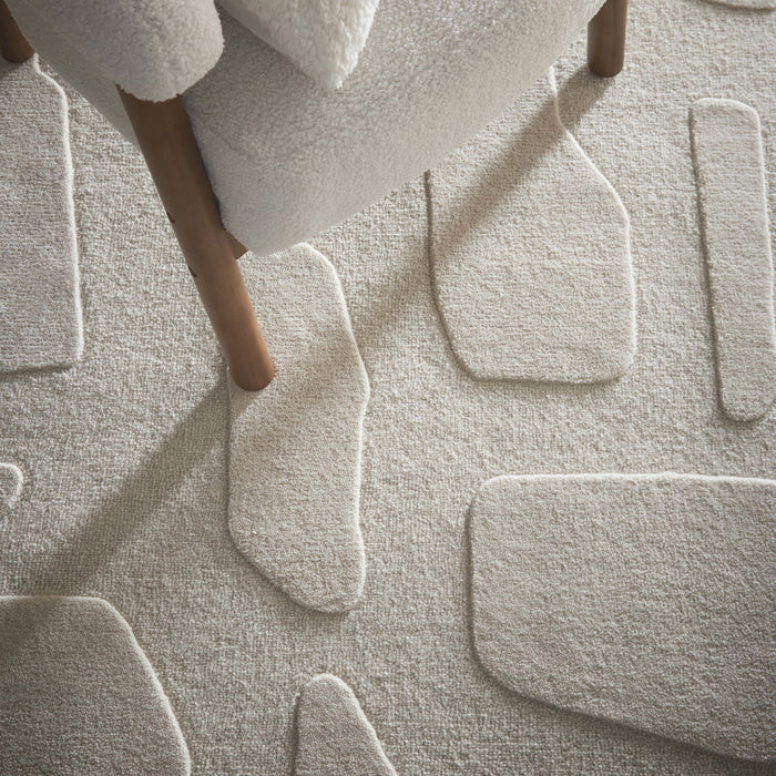 Sculptured Wool Stone Rug in Cream. 100% wool cut & loop pile rug in Cream with a patterned design.