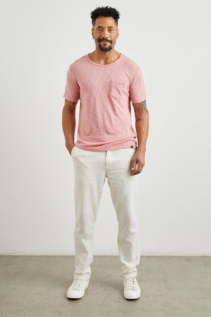 Skipper Short-Sleeve T-shirt with a Crew Neck and a Chest Patch Pocket in Equator Colorway, a Pink - Front Full Body View Featured on Model