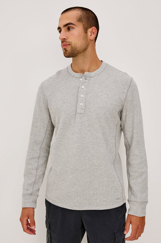 Soto Henley in Rib Cotton With Half Button Placket, Long Sleeves, and Crew Neckline in Grey Heather Colorway - Upper Body Front View Featured on Model