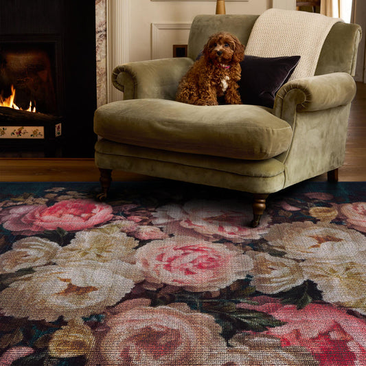Twilight Garden Eco-Washable Rug made from 100% recycled materials, featuring an oversized bloom pattern against a black background.