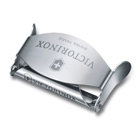 A silver-colored Victorinox brand peeler with a metal body and a sharp blade for kitchen use.