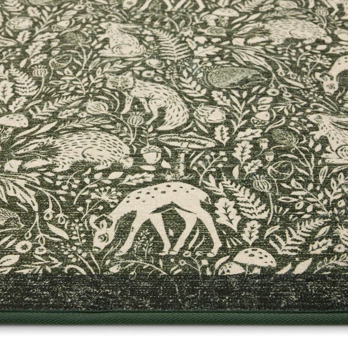 Whimsical Woodland Green Eco-Washable Rug made from 100% recycled materials. featuring a woodland design.