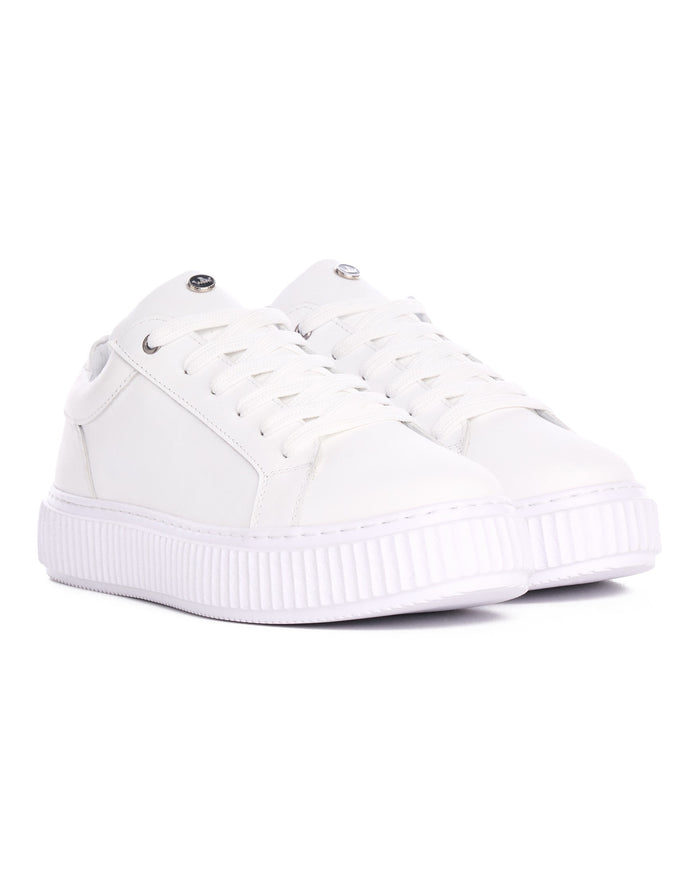 Martin Valen white leather sneakers top-down view showing metal eyelets and laced front