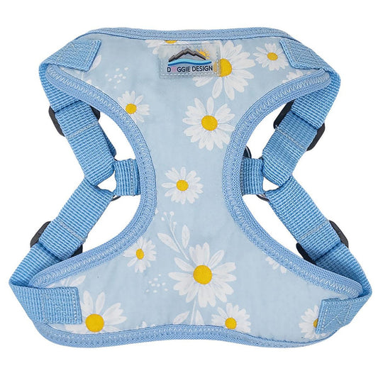 Dog harness with daisy pattern on a light blue background